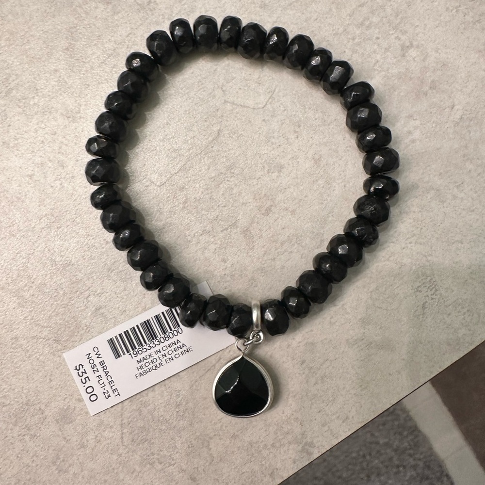 Jet black stretch bracelet with stone dangle by Chico’s